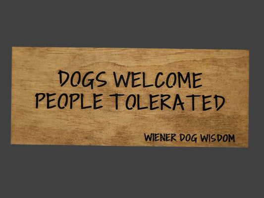 DOGS WELCOME PEOPLE TOLERATED
